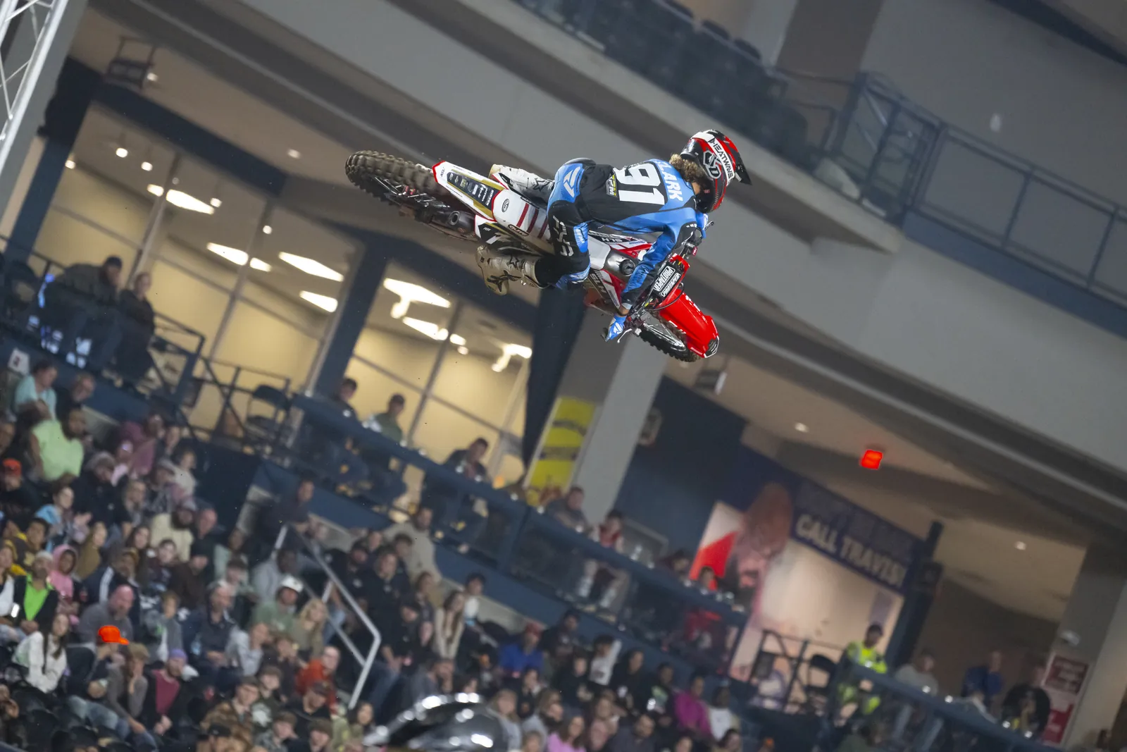 Izaih Clark whipping his Honda over the crowd
