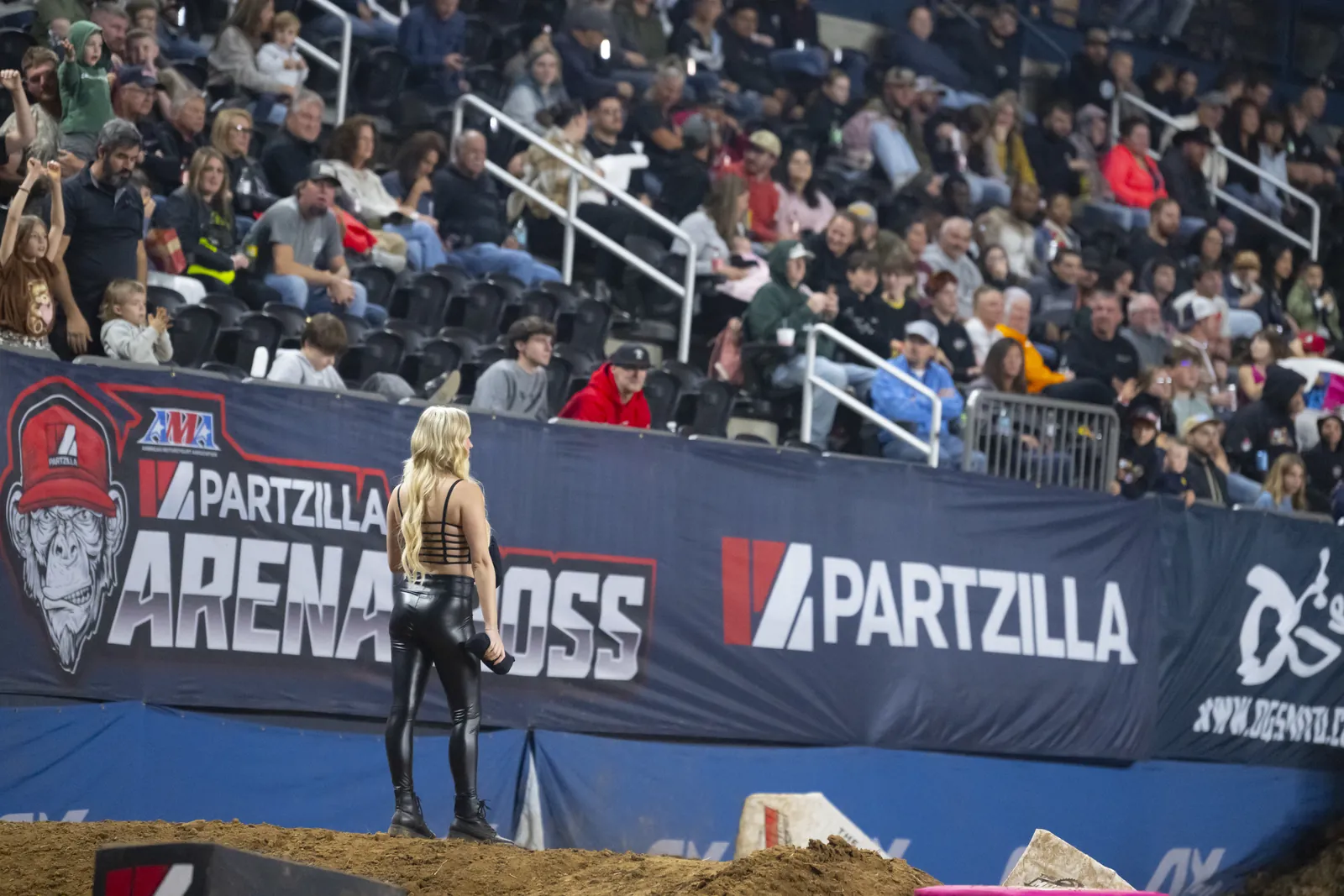 The crowd at F&M Bank Arena behind the Arenacross banner